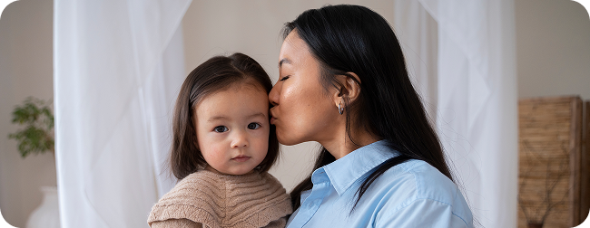 Asian mother and daughter spending time together at home